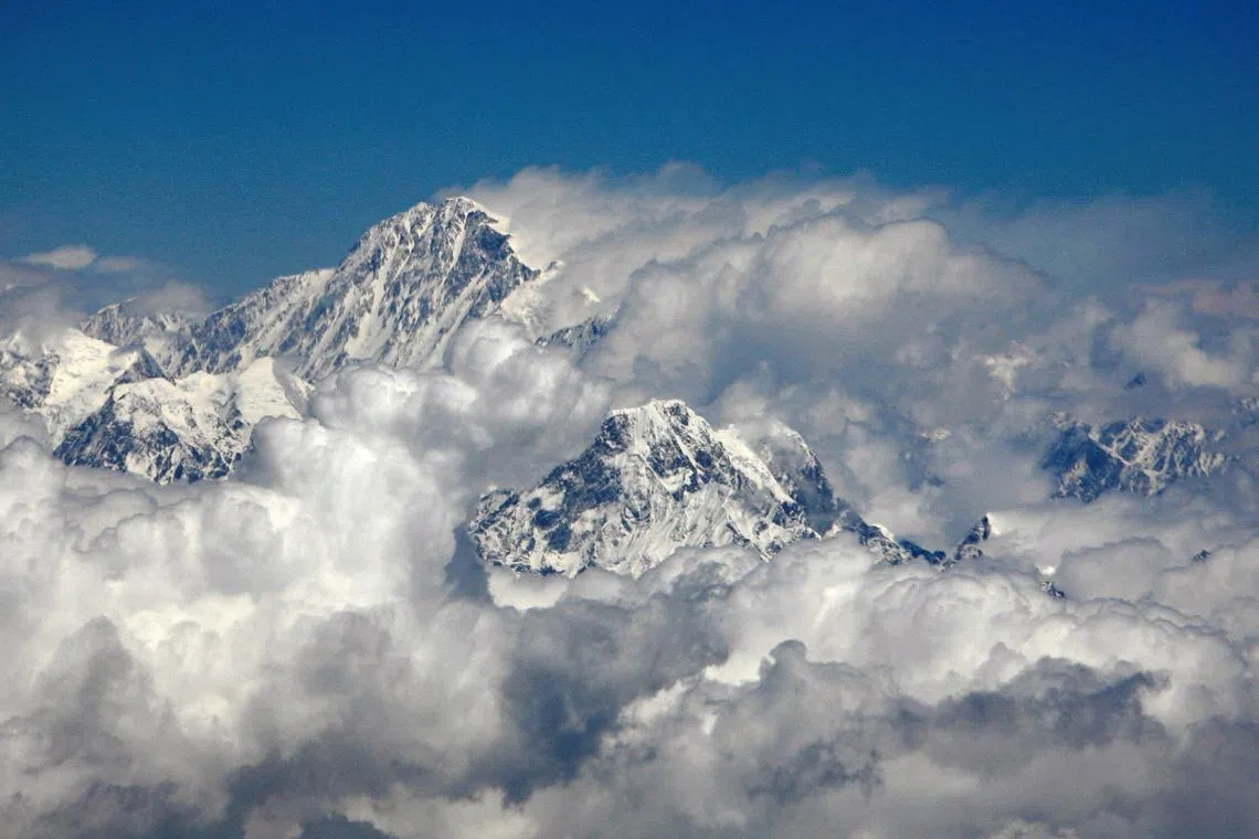 Everest, also called Sagarmatha in Nepali and Chomolungma in Tibetan, is situated on the border between Nepal and the Tibet Autonomous Region of China.