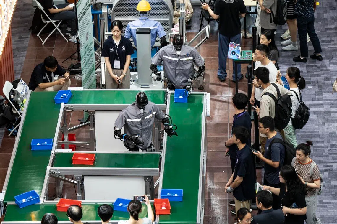 Robots on display at the World Artificial Intelligence Conference in Shanghai, China, July 28, 2025. China's top leaders have promised generous funding and policy support for tech and innovation over the next five years.