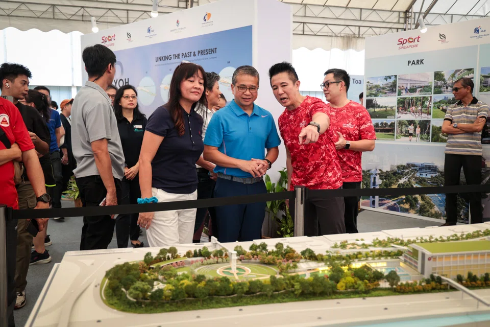 Minister for Culture, Community and Youth Edwin Tong overlooking the 3D model of the future Toa Payoh Integrated Development during the groundbreaking ceremony.