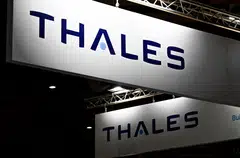 A French judge has charged the defence group Thales with complicity in bribery over a 2002 sale of submarines to Malaysia.