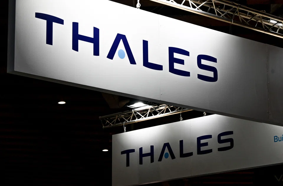 A French judge has charged the defence group Thales with complicity in bribery over a 2002 sale of submarines to Malaysia.