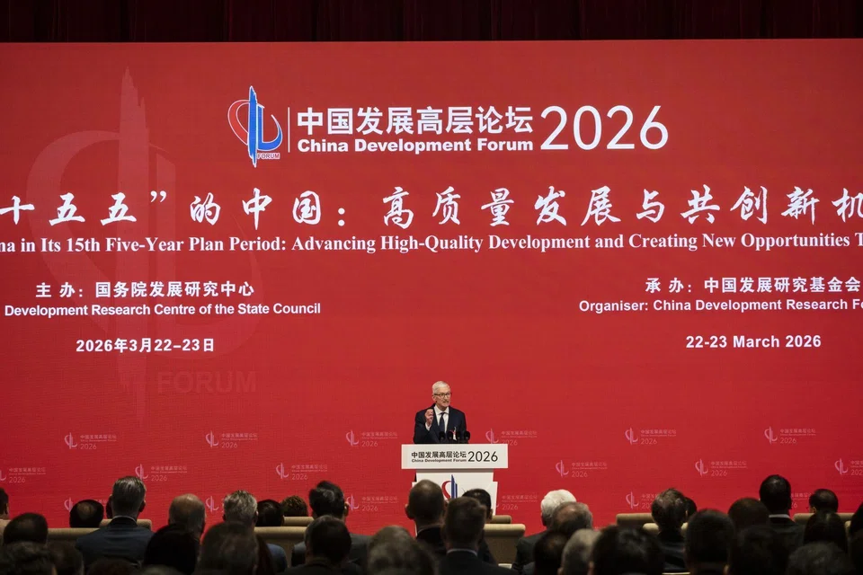 Apple CEO Tim Cook speaks at the China Development Forum in Beijing, China, March 22, 2026. 