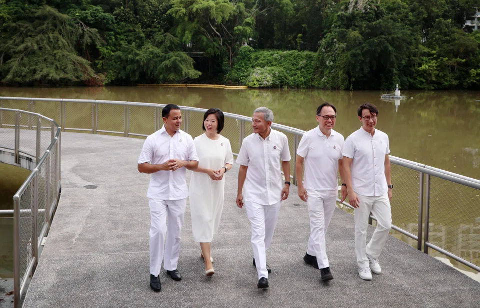 From left: The PAP team for Holland-Bukit Timah GRC features Christopher de Souza, Sim Ann, Vivian Balakrishnan and Edward Chia (extreme right). With them is Liang Eng Hwa (second from right), who will defend the single-seat Bukit Panjang ward.