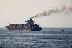 US forces patrol near the Iranian-flagged cargo ship Touska after it was boarded and seized by the US on Sunday (Apr 19).