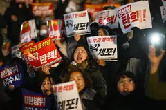 Protestors calling for the resignation of South Korean President Yoon Suk-yeol on Dec 4 after he imposted martial law.