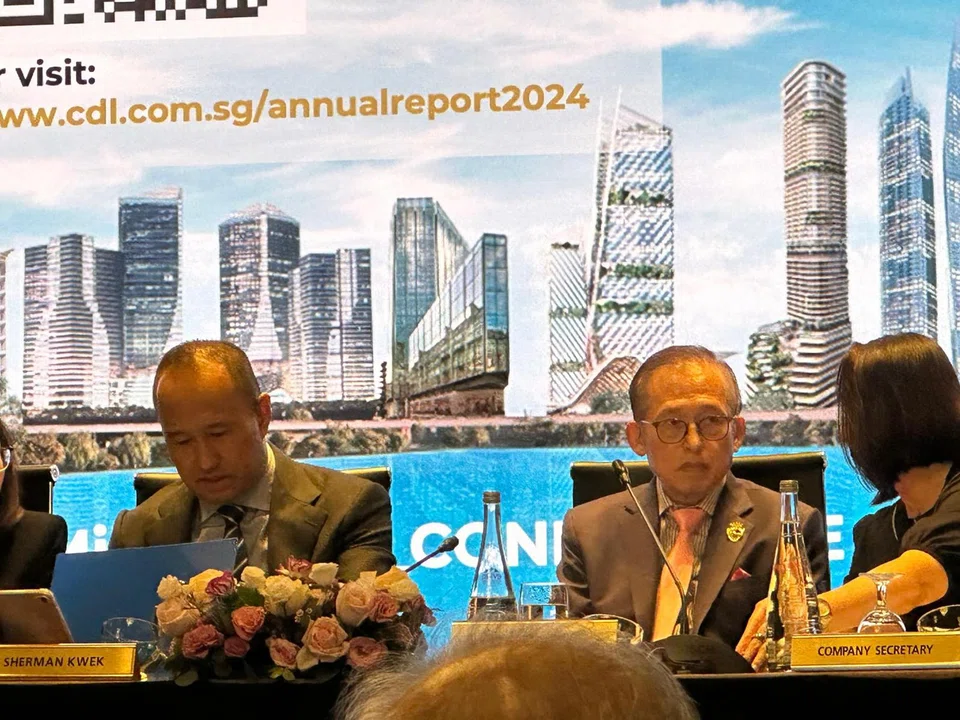 CDL executive chairman Kwek Leng Beng (right) and his son and group CEO Sherman Kwek at the AGM on Apri 23..