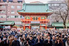 Visitors offering prayers on the first business day of the year at the Kanda Myojin shrine in Tokyo on Jan 4. There are reasons to be optimistic about investing in Japan, including corporate governance reforms and cheap money.