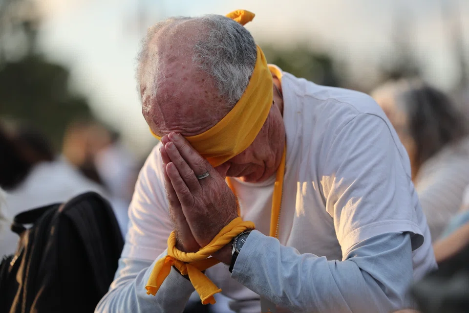 A demonstrator in Israel calling for the release of hostages in Gaza. Various sources say Donald Trump wants to see the war in Gaza end and the hostages there freed before he assumes office in January.