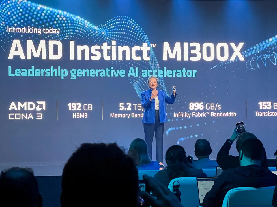 AMD CEO Lisa Su holds the company's new MI300X chip at an event outlining AMD's artificial intelligence strategy in San Francisco, US, June 13, 2023.