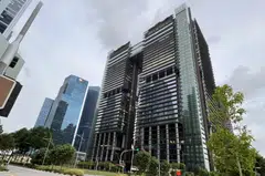 Marina One West Tower (right) is joined at levels 28 and 29 to the adjacent East Tower.