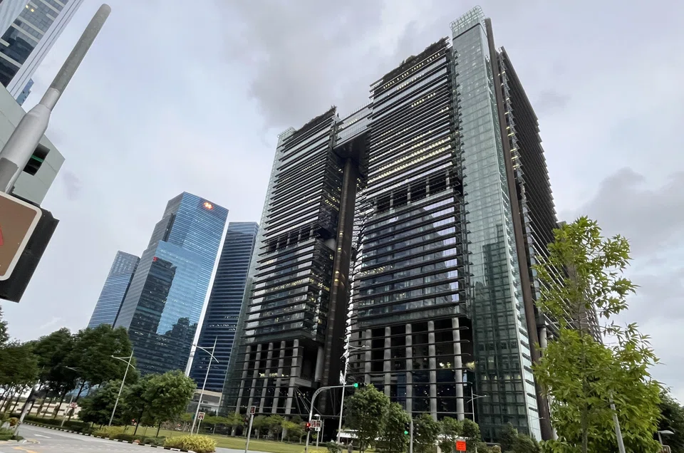 Marina One West Tower (right) is joined at levels 28 and 29 to the adjacent East Tower.