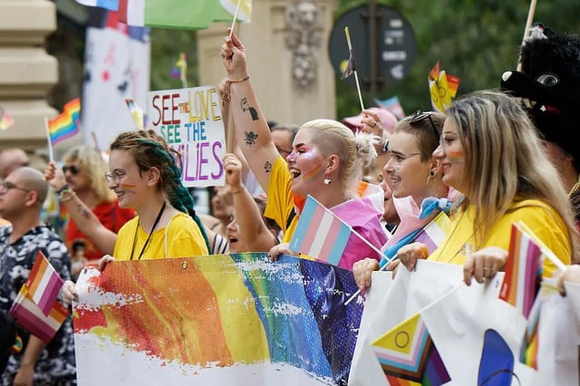 One way to defray the cost of moving and living for queer people is by working together.