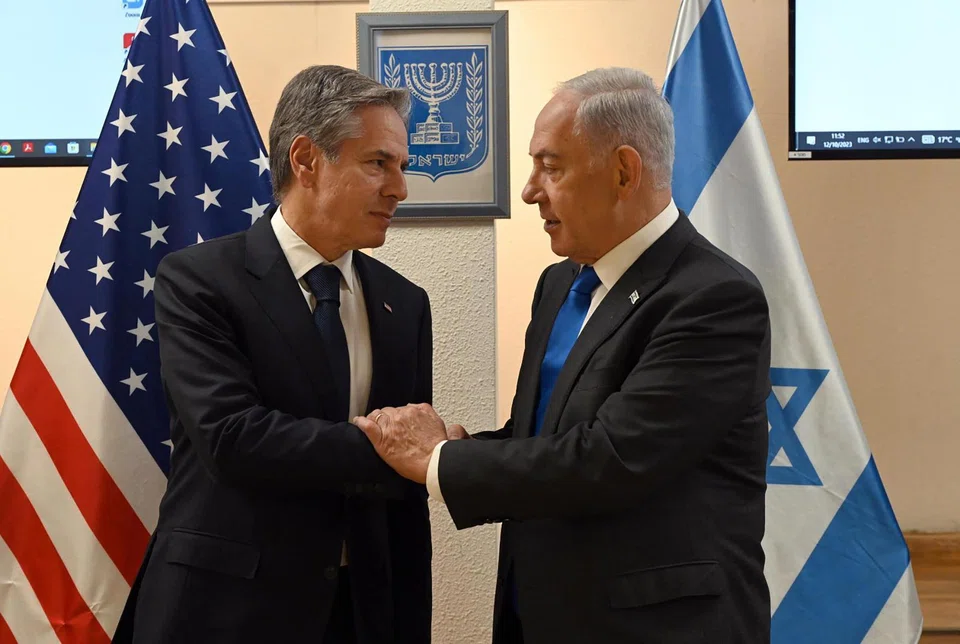 US Secretary of State Antony Blinken (left) with Israeli Prime Minister Benjamin Netanyahu (right) during a meeting in Tel Aviv, Israel, Oct 12, 2023. 