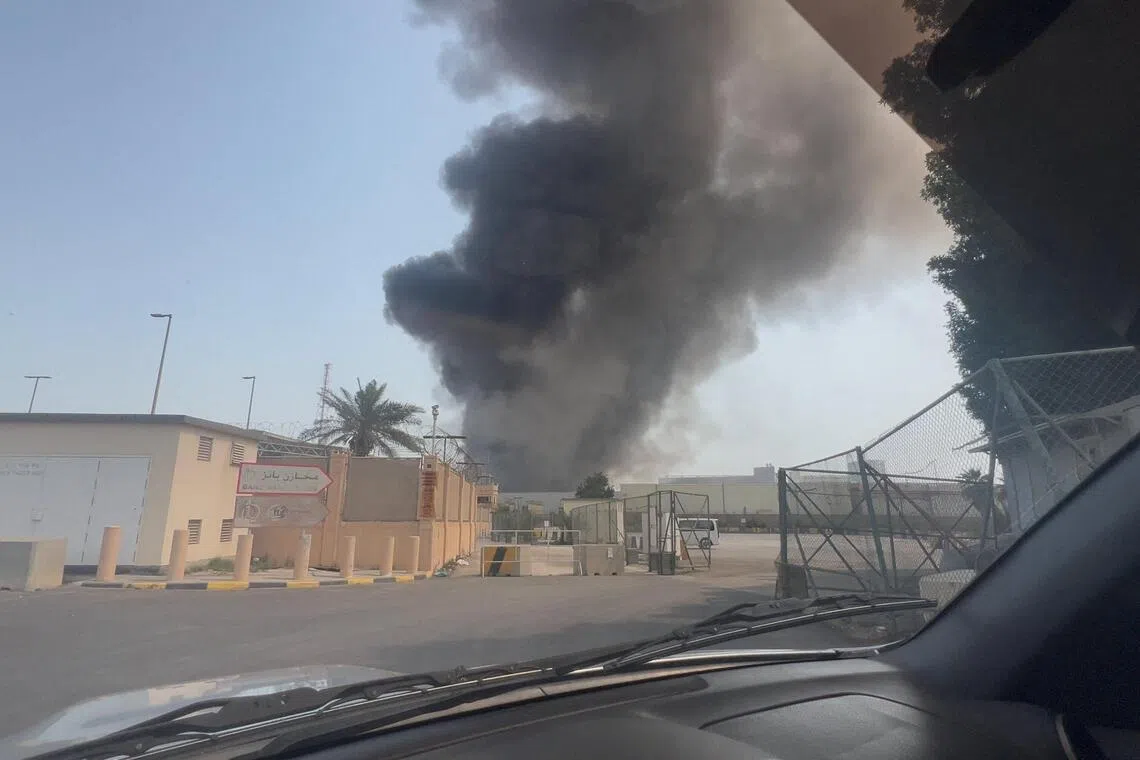 Smoke rises from the direction of a US naval base in Bahrain. MTQ's facilities in Bahrain and UAE have resumed operations.