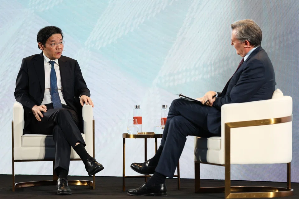 In a conversation with John Micklethwait, editor-in-chief of Bloomberg News (right), Prime Minister Lawrence Wong covered topics ranging from nuclear energy to social security, but focused on geopolitics and trade.