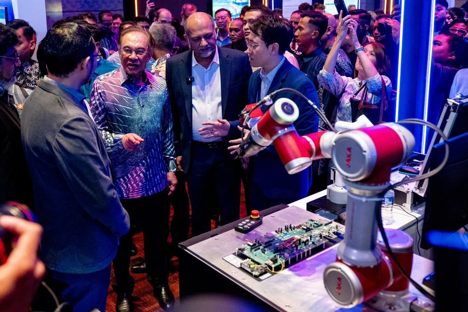 Malaysia Prime Minister Anwar Ibrahim (second from left) and Minister of Digital Gobind Singh Deo (third from left) at the launch of the National Artificial Intelligence Office, in Kuala Lumpur.