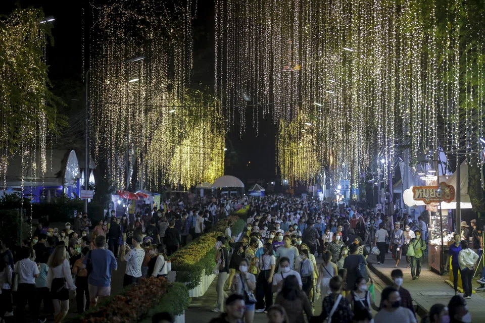People visit the annual Red Cross fair at a park in Bangkok on Dec 15, 2022. Thailand’s central bank has forecast the economy to expand 3.2 per cent this year, 3.7 per cent in 2023 and 3.9 per cent in 2024.