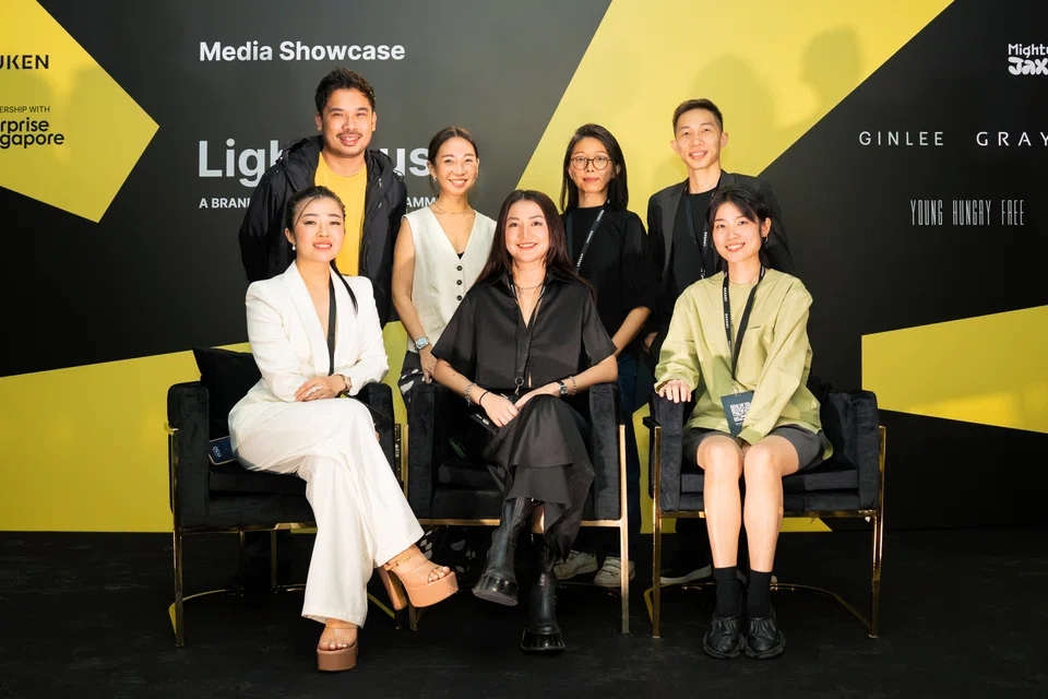 Representatives from seven of the eight Lighthouse companies. Back row, from left: Jackson Aw of Mighty Jaxx; Jaime Lee of The Paper Bunny; Gin Lee of Ginlee Studio; and Ivan Tan of Epitex. Front row, from left: Quinn Chen of Ice's Secret; Winnie Ong of Young Hungry Free; and Xie Qianqian of Graye.