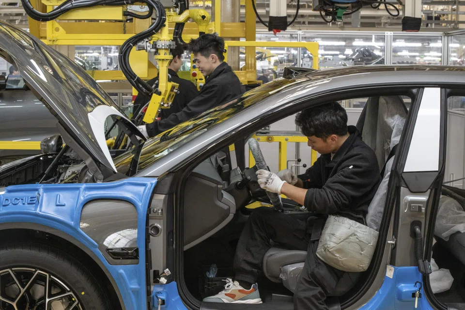 FILE -- An electric vehicle factory in Ningbo, China, April 9, 2024. Emerging market and developing economies are growing at a rate of 4 percent, led by China and Indonesia. (Gilles Sabrie/The New York Times) 