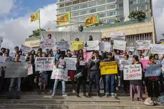 Sri Lankan protesters in 2022, calling for the president to resign over the economic crisis. Sri Lanka has faced long delays in receiving debt relief, because their Chinese creditors refuse to agree to the debt-restructuring terms agreed in the Paris Club.
