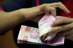 As at 6.59pm on Thursday, the rupiah was trading at 16,002 against the US dollar.