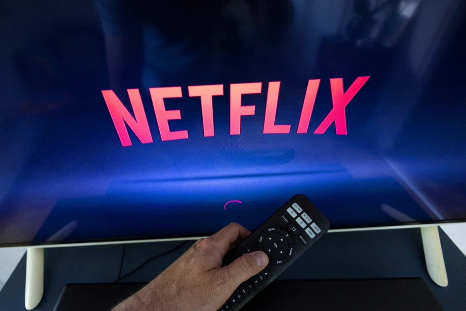 NETFLIX shares fell 5 per cent on Friday (Jun 10) after Goldman Sachs downgraded the streaming giant, which is facing a slowdown in consumer spending and tough competition from Amazon.com and Walt Disney.