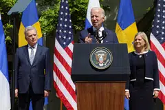U.S. President Joe Biden delivers remarks next to Sweden's Prime Minister Magdalena Andersson and Finland's President Sauli Niinisto, in the Rose Garden of the White House in Washington.