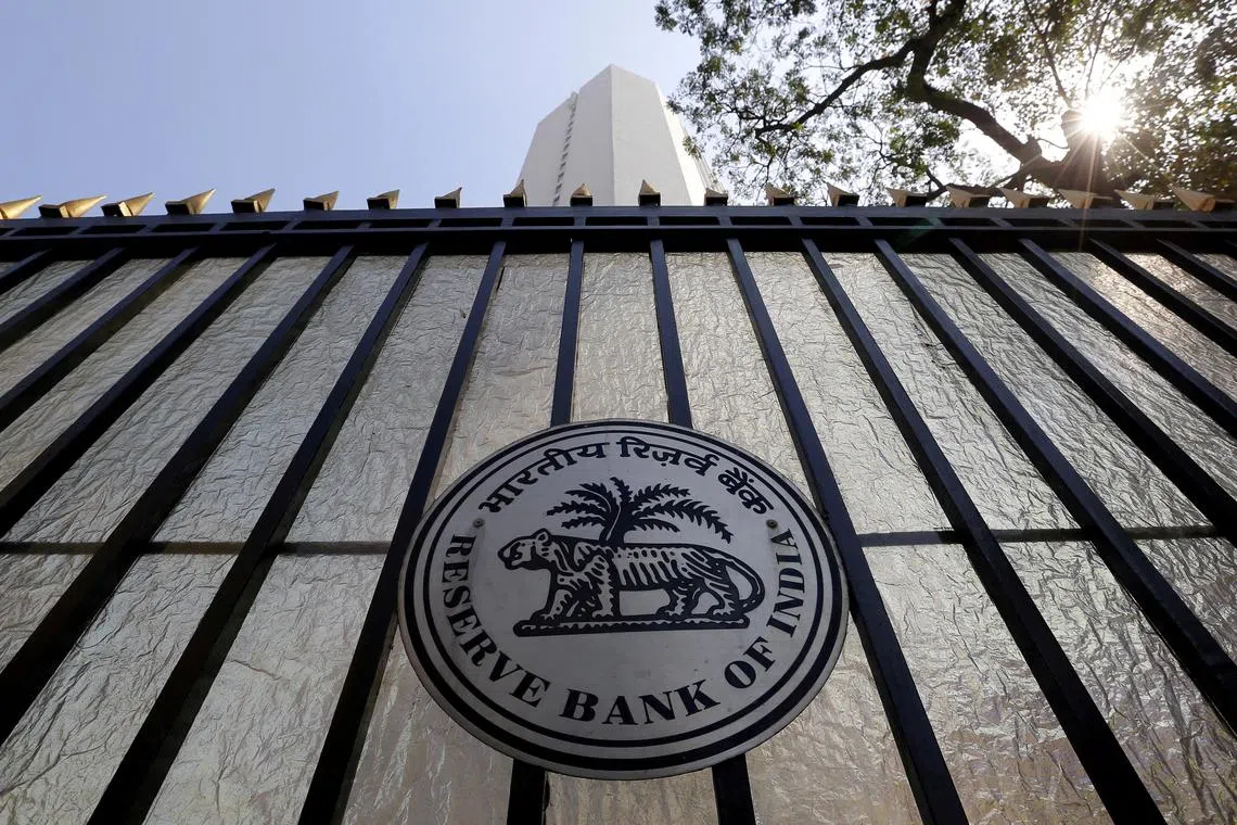FILE PHOTO: The Reserve Bank of India (RBI) seal is pictured on a gate outside the RBI headquarters in Mumbai, India, February 2, 2016. REUTERS/Danish Siddiqui/File Photo