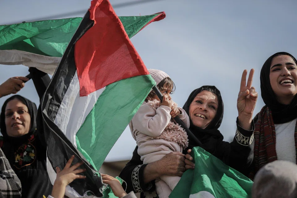 Palestinians celebrating the start of a ceasefire in southern Gaza. The troubling tensions in the Middle East have been a significant headwind for the global economy for the best part of 500 days, including energy markets.
