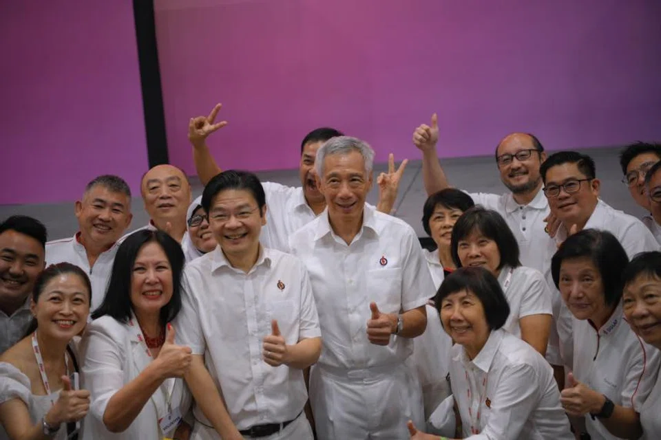 PM Lee Hsien Loong and DPM Lawrence Wong mingling with party members after the PAP’s convention on Nov 5. 