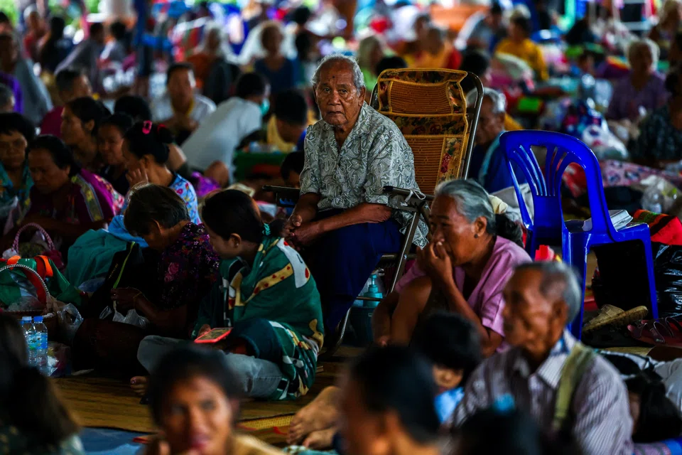 Displaced people are seen inside a shelter in Sisaket province, as Cambodia and Thailand each said the other had launched artillery attacks across contested border areas early on Sunday (Jul 27).