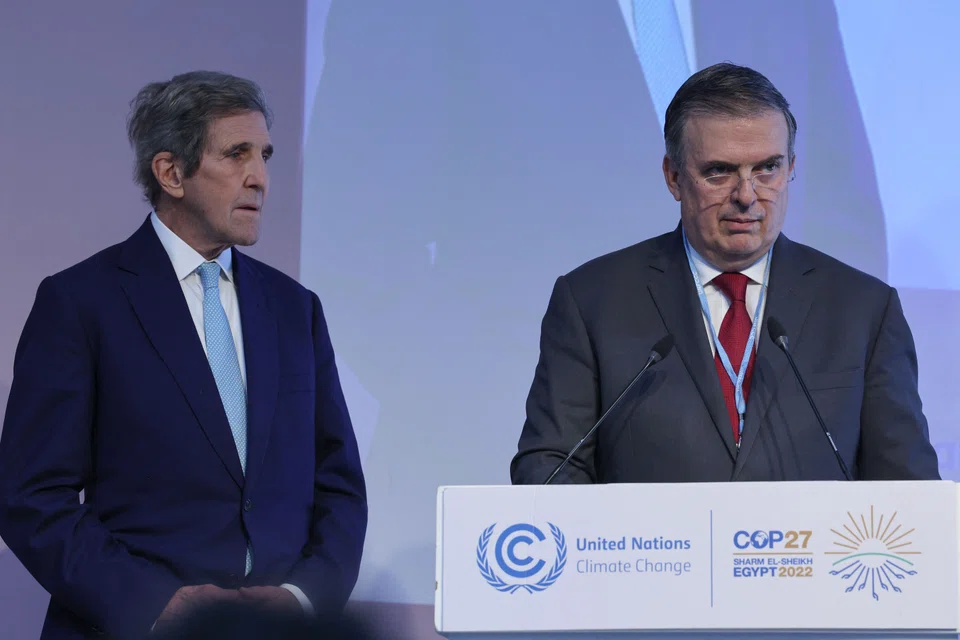 Mexican Foreign Minister Marcelo Ebrard (R) and US climate envoy John Kerry hold a press conference on the sidelines of the COP27 conference in Sharm el-Sheikh, on Nov 12, 2022.