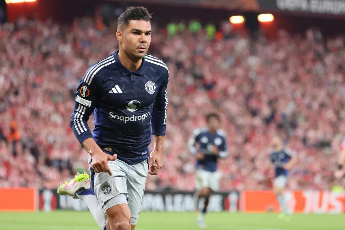 Manchester United's Casemiro celebrating after scoring the first of his team's three goals in the Europa League semi-finals first-leg match with Athletic Bilbao. 