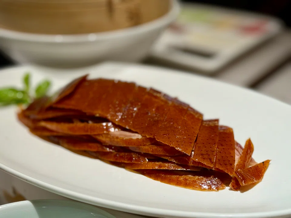 Perfectly sliced crisp duck skin.