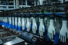 For glove makers in particular, a firmer exchange rate erodes company earnings when converted back to ringgit.