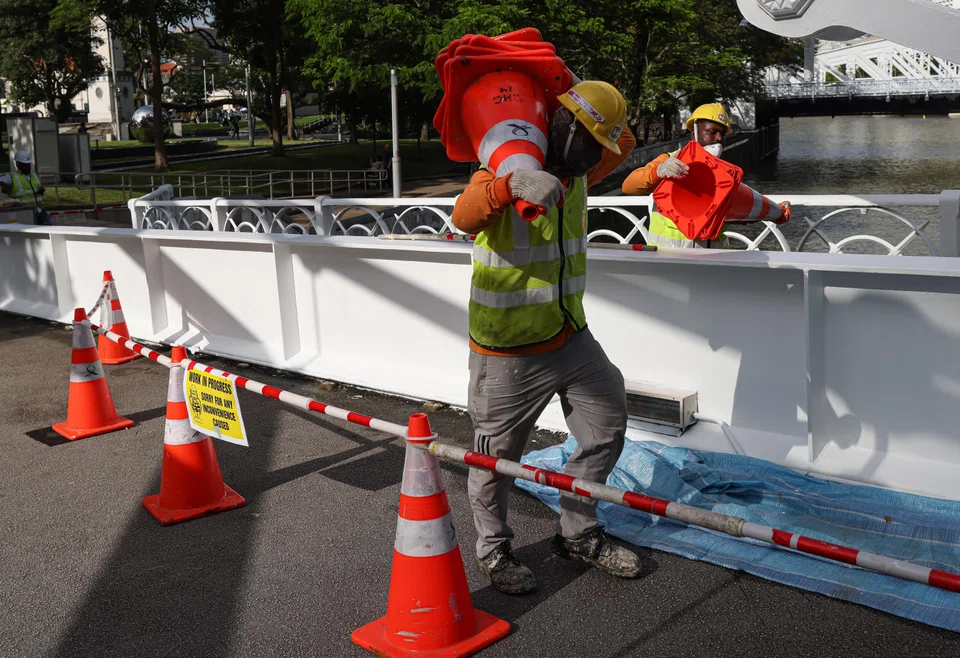 The changes to work permit holder rules will allow firms to build a more skilled and resilient workforce, says Minister for Manpower Tan See Leng. 