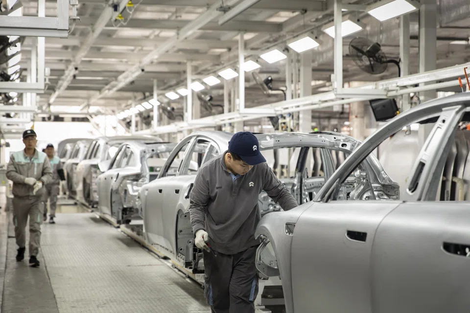 An automobile assembly line in China. As the centre of gravity of the world economy continues to move towards Asia, political shifts are inevitable.