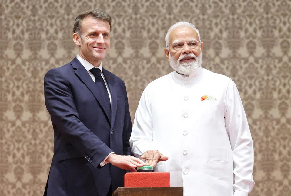 French President Emmanuel Macron (left) and Indian Prime Minister Narendra Modi in Mumbai on Feb 17. An anticipated US$35.7 billion agreement propels India and France into a new era of defence cooperation.