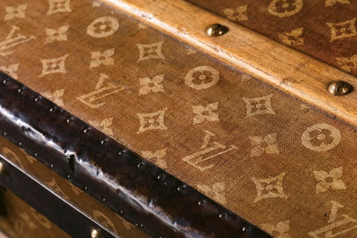 The iconic monogram on an 1897 trunk.