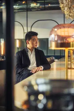 Until recently, Zach Lee has stayed under the radar. He wears a shirt from Boss, and overshirt and jeans from Zegna.