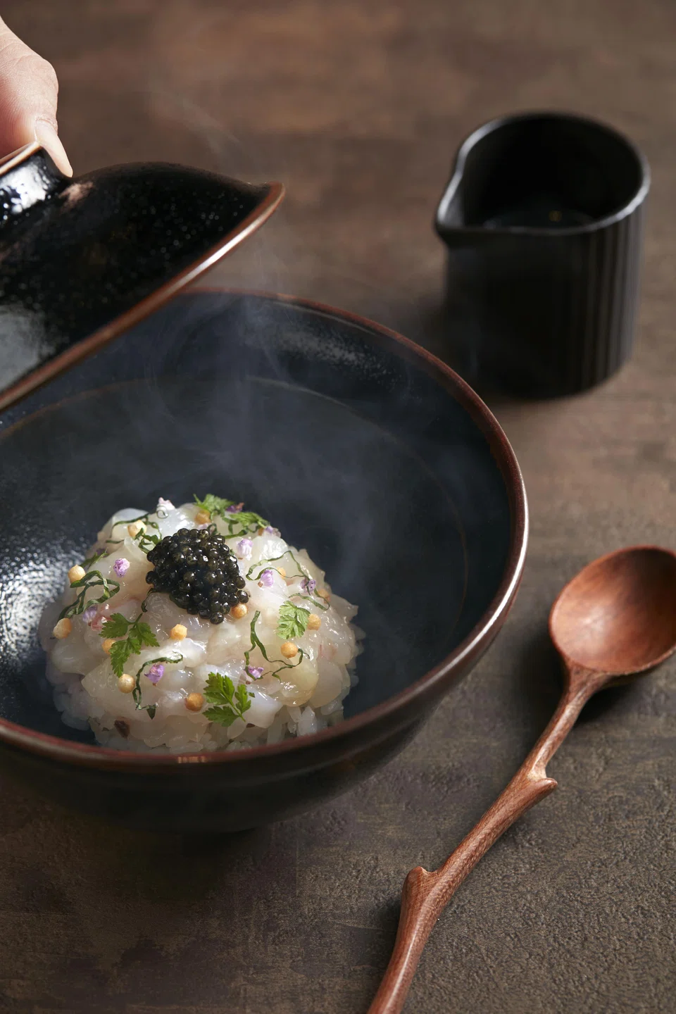 Scampi ochazuke features apple wood smoked scampi and rice in a perfumed broth.