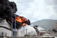An industrial building and a fuel tanker at Israel's Oil Refineries were hit by debris from an intercepted Iranian missile, in Haifa, Israel on Mar 30.