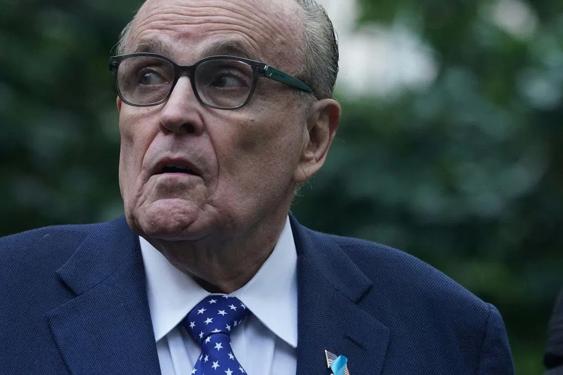 At a court hearing in Washington on Friday, District Judge Beryl Howell found Rudy Giuliani (pictured) in contempt and threatened him with potential fines if he continues to make defamatory remarks about the pair. It was the second time this week Giuliani was found in contempt of court.