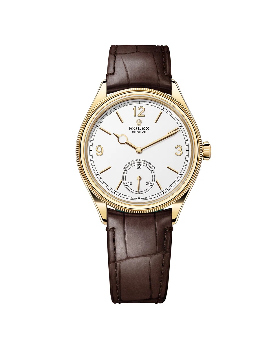 The Perpetual 1908 in 18-karat yellow gold with an intense white dial and alligator leather strap.