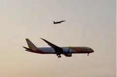 One of two RSAF fighter jets escorting Scoot flight TR16 back to Changi Airport on Thursday. 