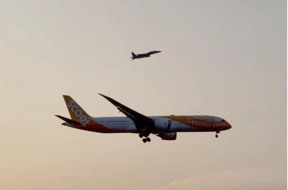 One of two RSAF fighter jets escorting Scoot flight TR16 back to Changi Airport on Thursday. 