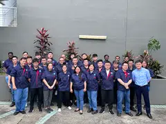 Jade Micron chief executive officer Jeff Wang (front row, extreme right) with his employees. Employee satisfaction and retention are key priorities for the company, said Wang.