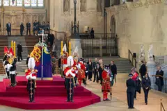 Mourners file past the coffin of Queen Elizabeth lying in state at Westminster Hall in London, Britain Sept 14, 2022.