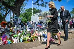 US President Joe Biden and First Lady Jill Biden pay their respects at a makeshift memorial outside of Robb Elementary School in Uvalde, Texas on May 29, 2022. 