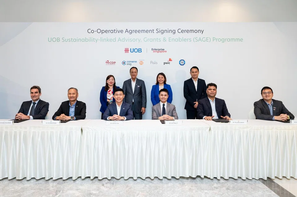 Representatives from UOB, Enterprise Singapore, Paia Consulting, TUV SUD Asean, PwC Singapore, M1 and CDP at the launch of the Sage programme.